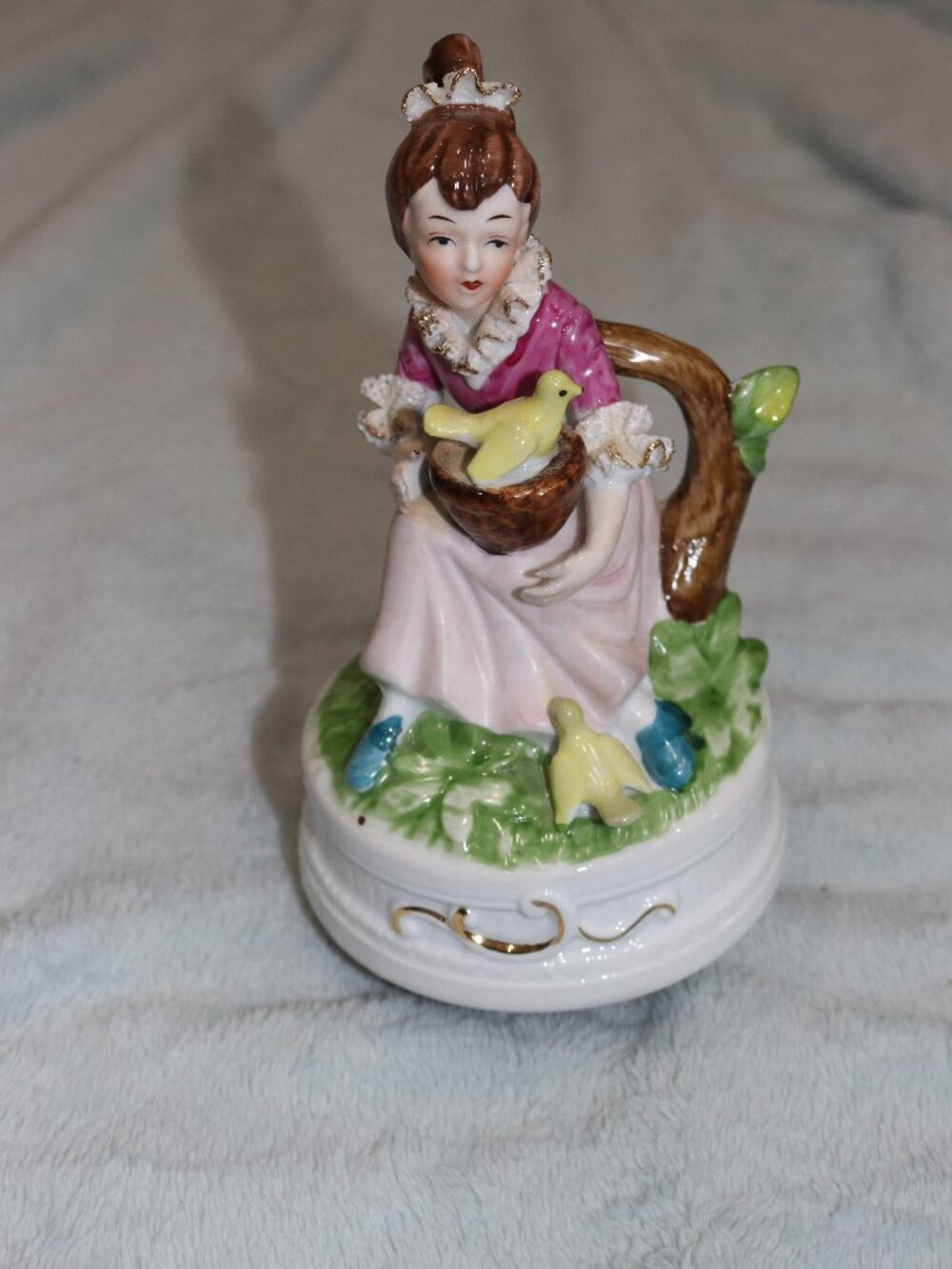 Vintage music box, 1980s, girl with birds.